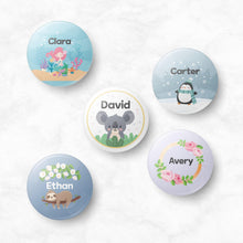Load image into Gallery viewer, custom name button, custom name badge, personalized name button, personalized name badge, pin-back, button badge, pin-back badge, name label, name tag, school badge, kids badge, daycare badge, camp badge, school button, camp button, daycare button, kids button, kids gift, birthday gift, friends gift, bag badge, name tag, tag badge, tag button, button tag, makeup mirror, cosmetic mirror, hand mirror, portable mirror
