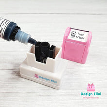 Load image into Gallery viewer, custom clothing stamp, custom name stamp, personalized clothing stamp, personalized name stamp, clothing name stamp, name clothing stamp, pre-inked stamp, self-inking stamp, flash stamp, textile stamp, fabric stamp, clothes stamp, diaper stamp, school stamp, daycare stamp, camp stamp, name stamp, refill ink
