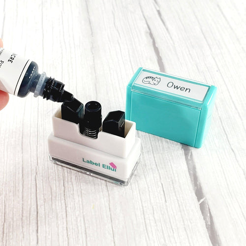 quick dry stamp, quick-dry stamp, custom quick dry stamp, personalized quick dry stamp, custom stamp, custom name stamp, personalized stamp, personalized name stamp, pre-inked stamp, self-inking stamp, flash stamp, , school stamp, daycare stamp, camp stamp, name stamp, refill ink, non-porous surfaces, glossy surfaces,