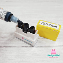 Load image into Gallery viewer, custom clothing stamp, custom name stamp, personalized clothing stamp, personalized name stamp, clothing name stamp, name clothing stamp, pre-inked stamp, self-inking stamp, flash stamp, textile stamp, fabric stamp, clothes stamp, diaper stamp, school stamp, daycare stamp, camp stamp, name stamp, refill ink
